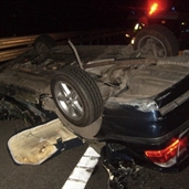 BMW hits 18 wheeler trailer bumper and rolled over