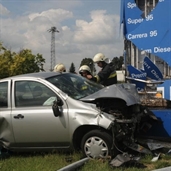 Nissan crashed into a gas station pricing signage