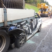 Driver tailgating 18 wheeler and crashed into it at a high speed