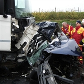 Severe car accident between VW and 18 Wheeler