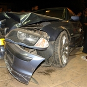 BMW car accident that crashed into the light pole