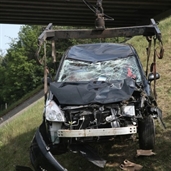 Toyota corolla rolled over the bridge